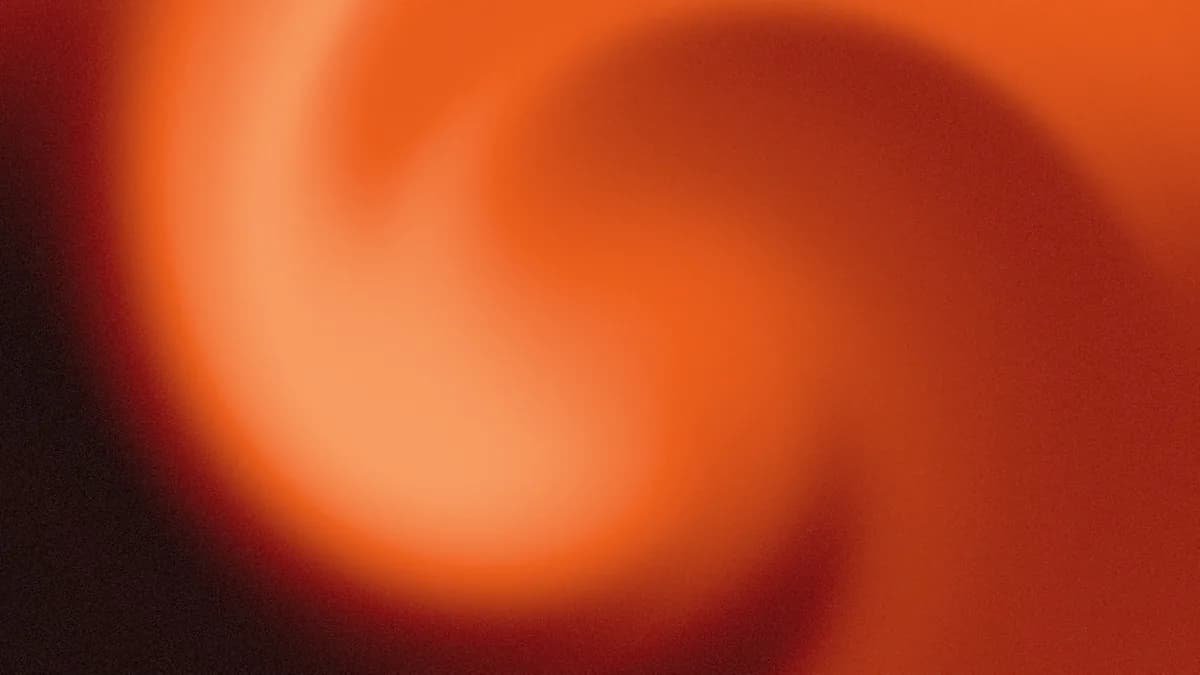 An orange swirl mesh gradient made in the Mesh Gradient Generator